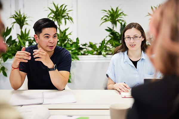 Image of colleagues working in an agile space