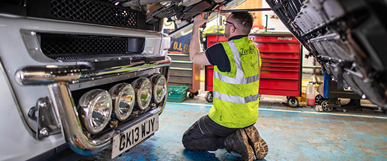 Image of colleague fixing truck