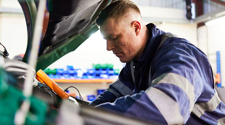 mechanic repairing car