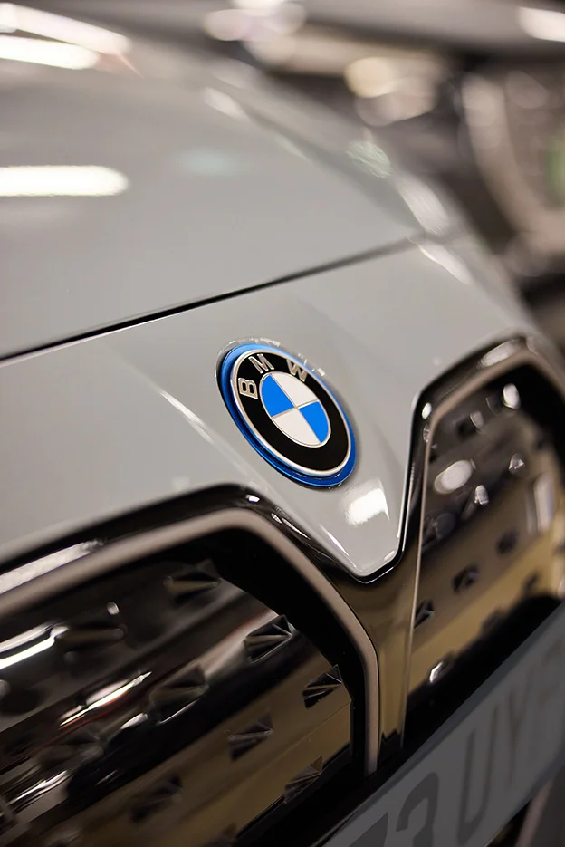 Close up shot of BMW bonnet with the badge and grill in view