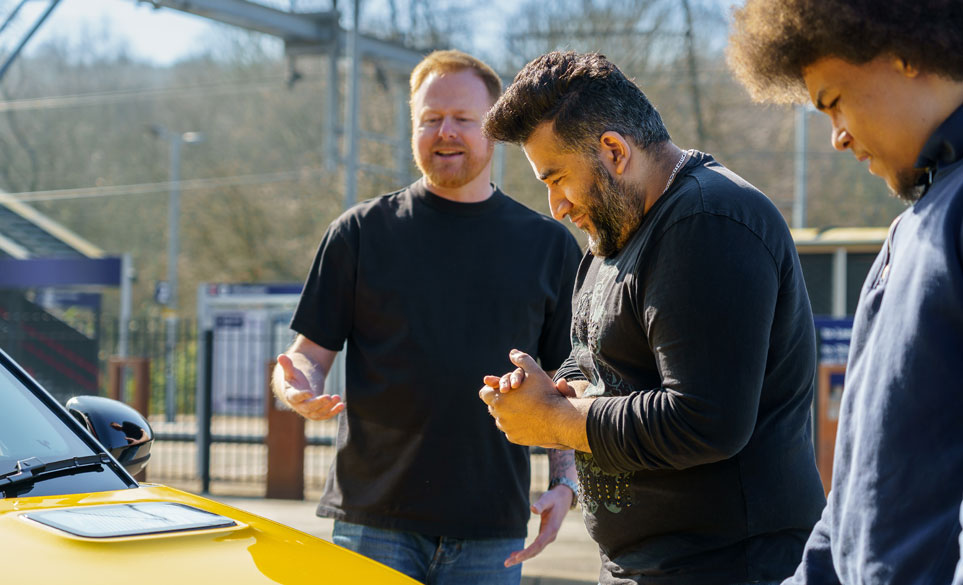 riz and rod discussing cars
