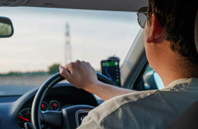 driving while following map on the phone.