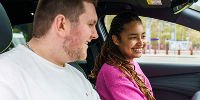 colleagues in a car discussing
