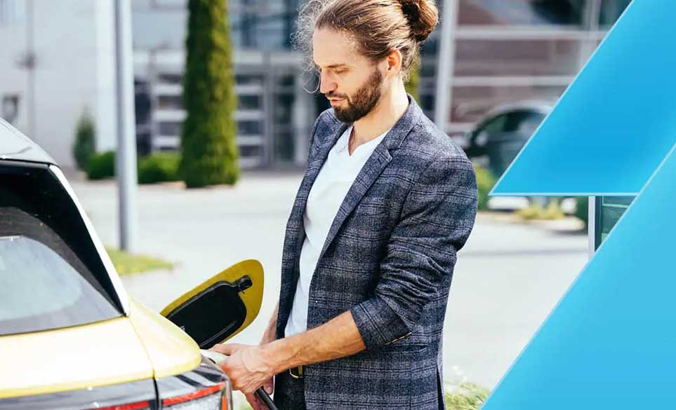 man charging car