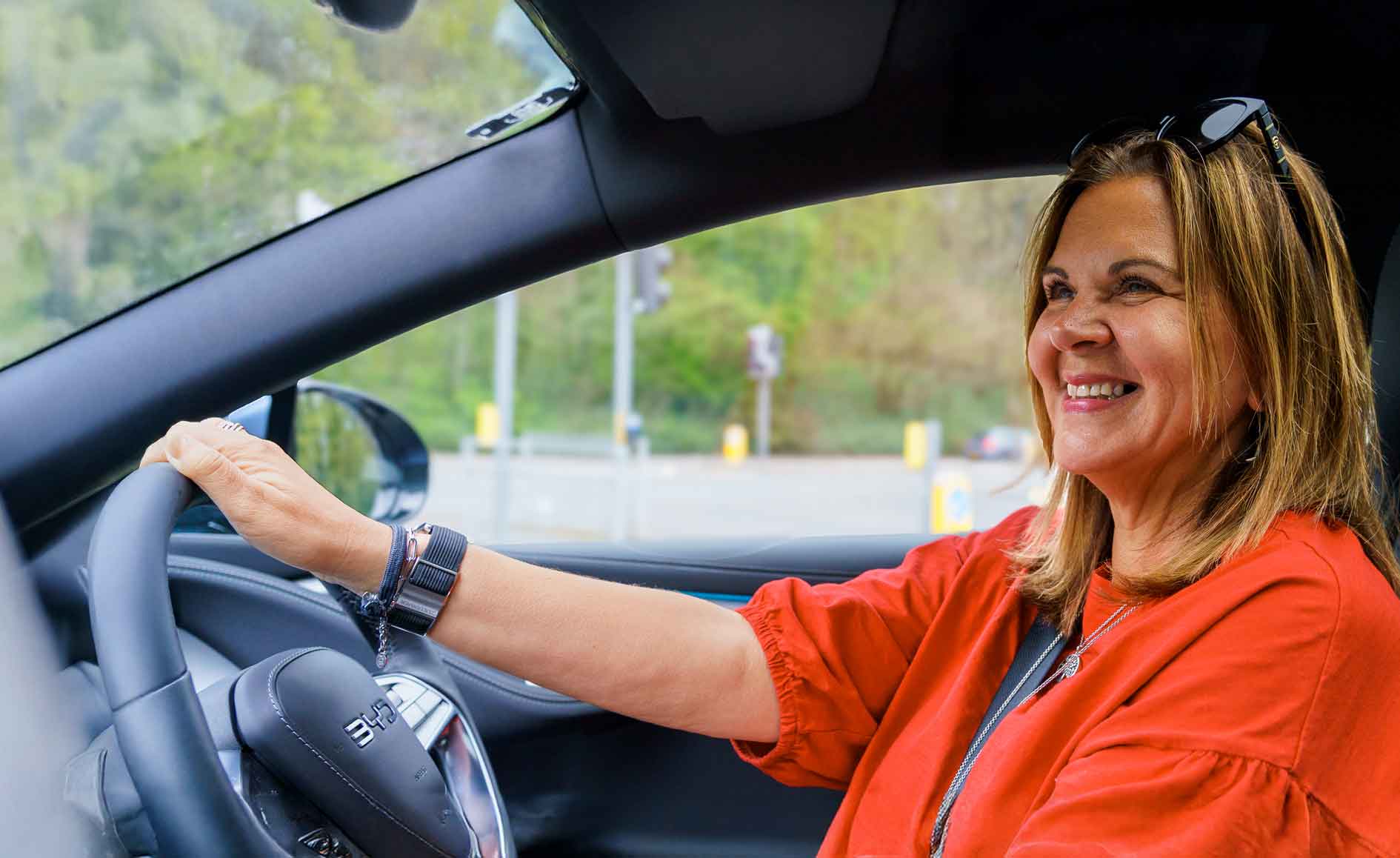 lady driving her new car