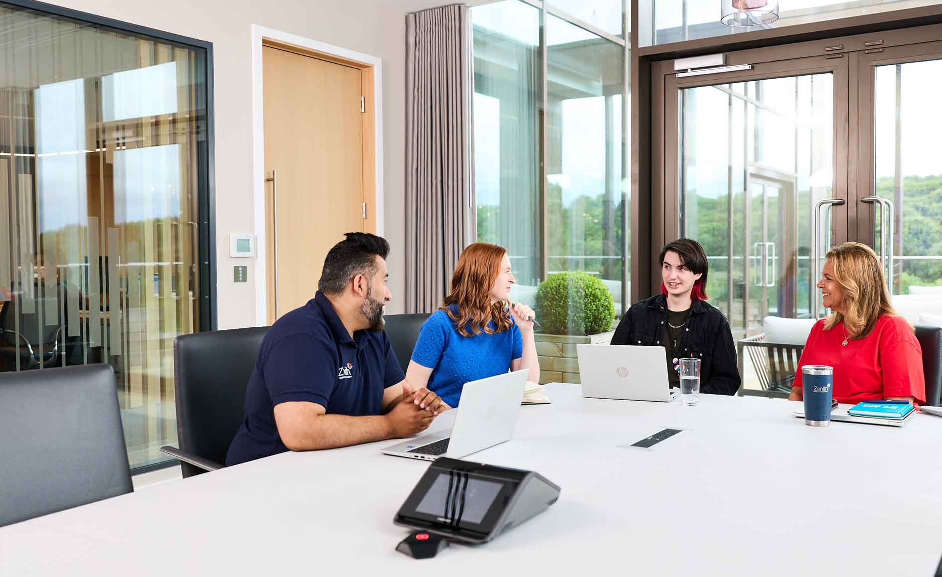 people discussing in the meeting room.
