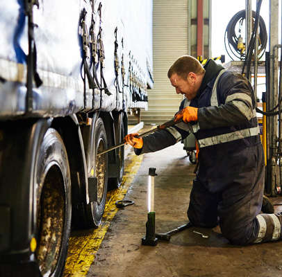 Person-repairing-tyre
