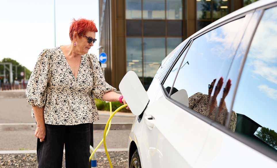 Lady charging the car