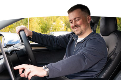 person in the car using touch screen