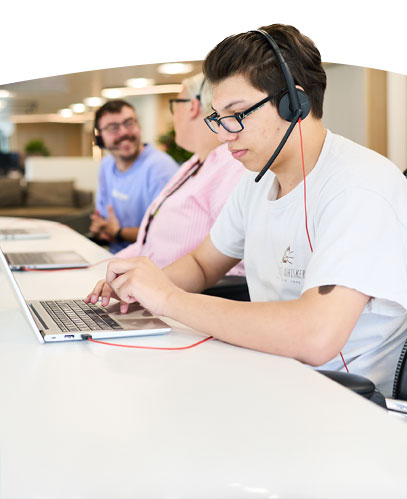 staff wearing headset helping