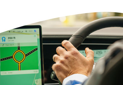 person driving using the built in sat nav.