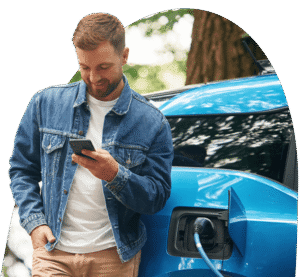 man leaning on his car