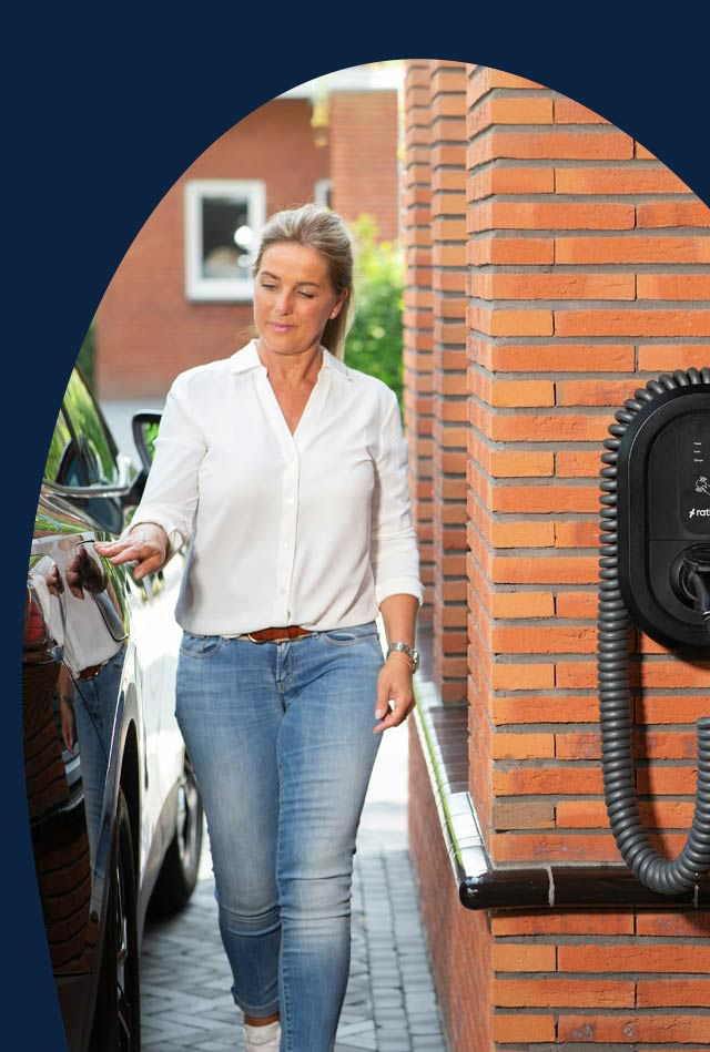 Lady about to charge her car.