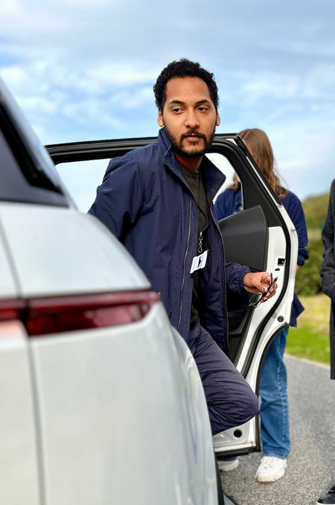man coming out the car.
